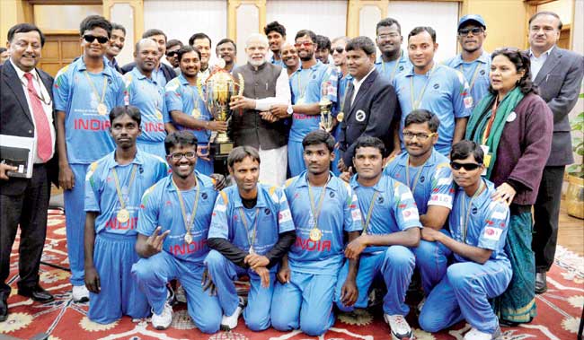 Well done, boys: Prime Minister Narendra Modi with members of India
