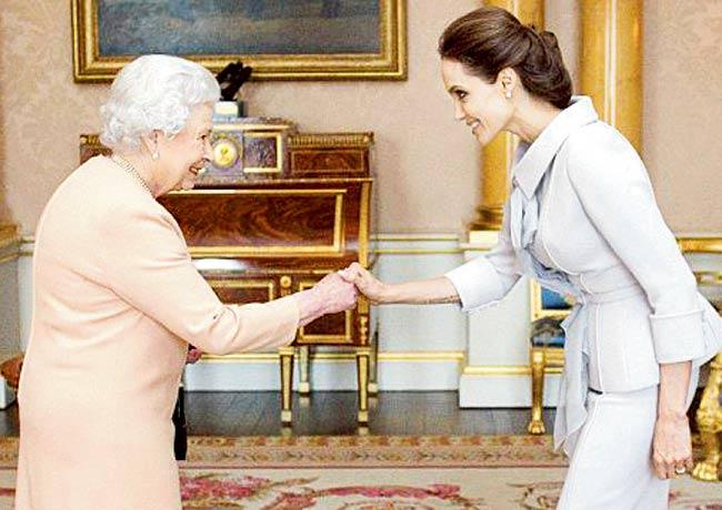 Queen Elizabeth II and Angelina Jolie. Pics/AFP