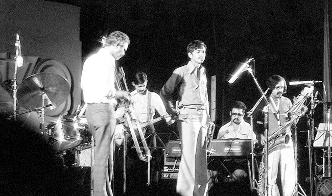 The Jazz-India Ensemble with Louiz Banks, Braz Gonsalves and others. Louiz Banks (second from right) can be seen playing on  the piano 