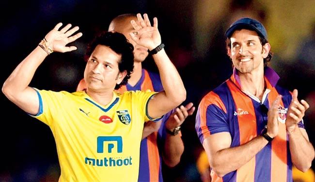 Hrithik Roshan (right) with Sachin Tendulkar during the launch of Indian Super League