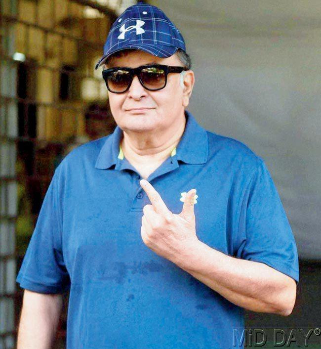 Rishi Kapoor arrived at the poll sporting a cap and sunglasses