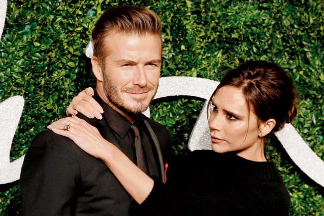 Love is in the air: David Beckham with wife Victoria at the British Fashion Awards 2014 in London recently. Pic/AFP