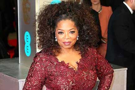 Oprah Winfrey says having children would have held her back