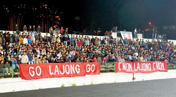 Before football matches in Shillong, the crowd prays for the match to go well