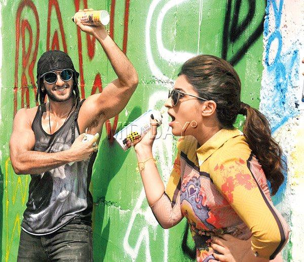 S-pray, tell me how to use it: Ranveer Singh and Parineeti Chopra turned graffiti artists for Kill Dil promotions. But, going by this picture, did they get it right?