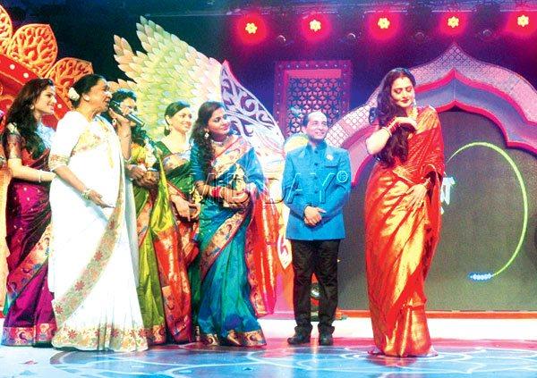 On a song: Rekha (right) grooves to the tunes of Asha Bhosle (in white) at a cultural extravaganza in SoBo in February