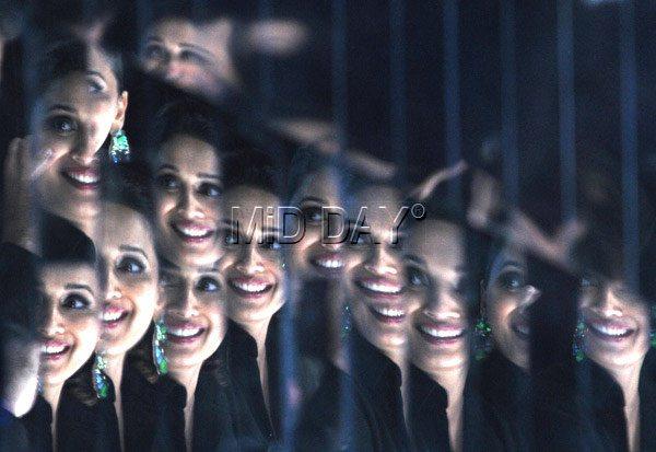 Mirror maze: The many faces of Madhuri Dixit as reflected in a mirror on the sets of the dance reality show make our hearts go dhak-dhak