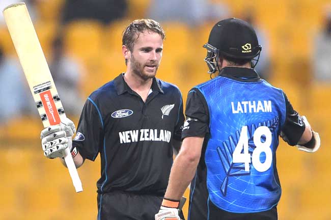 New Zealand captain Kane Williamson (L) celebrates with teammate Tom Latham after scoring century (100 runs) during the fourth day-night international cricket match between Pakistan and New Zealand at the Zayed International Cricket Stadium in Abu Dhabi. Pic/AFP