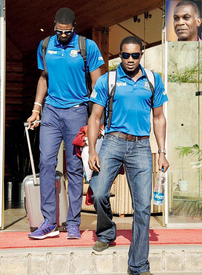 West Indies players leave the team hotel in Dharamsala on Saturday (Pic/PTI) and (Inset) Michael Holding