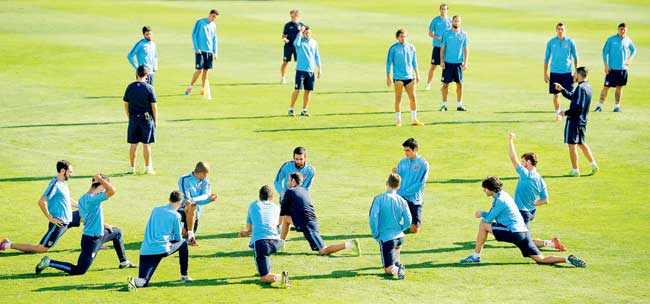 Atletico Madrid players train on the eve of their Champions League clash against Juventus. Pic/AFP