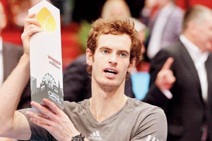 Andy Murray with the winner's trophy
