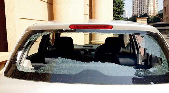A stray bullet from the Ghatkopar firing range shattered the rear windshield of this car 