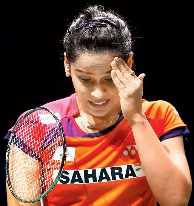Saina Nehwal reacts after losing a point to Tai Tzu Ying of Taiwan in the women