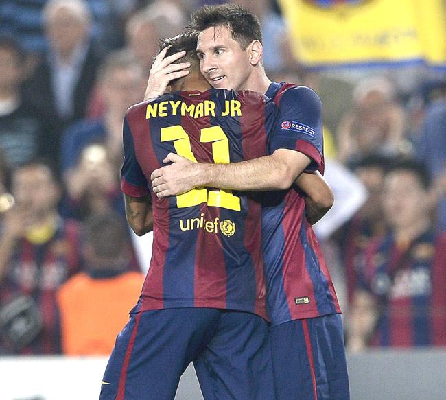 Barcelona-s Argentinian forward Lionel Messi R is congratulated by his teammate Brazilian forward Neymar da Silva Santos Junior after scoring during the UEFA Champions League football match FC Barcelona vs Ajax Amsterdam at the Camp Nou stadium in Barcelona. Pic/AFP