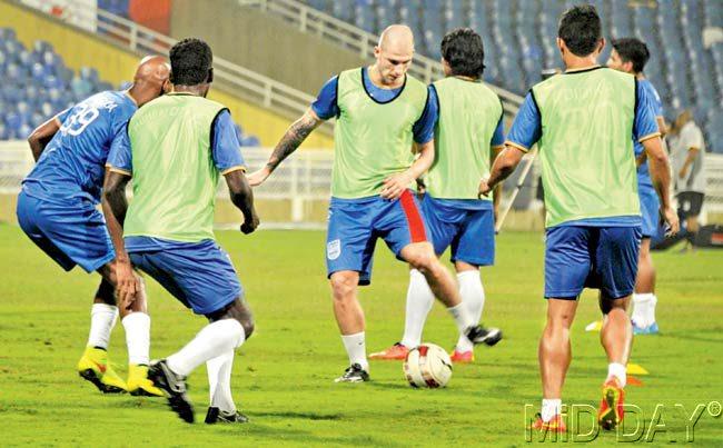 Mumbai City FC players during a practice session at the DY Patil Stadium, Nerul yesterday. The hosts will take on NorthEast United FC in an ISL match tomorrow. Pic/Suresh KK