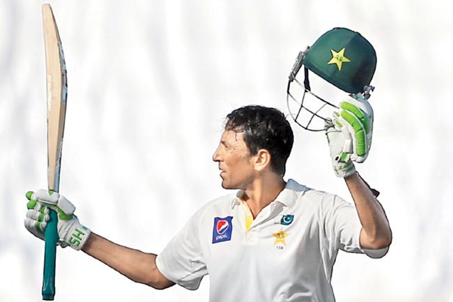 Younis Khan celebrates his ton against Australia on Saturday. Pic/AFP