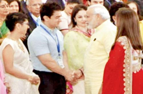 From left: Kiran Rao, Aamir Khan with Prime Minister Narendra Modi