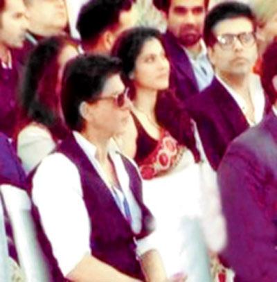 Karan Johar and Kajol; (top) the duo with Shah Rukh Khan at the event on Saturday