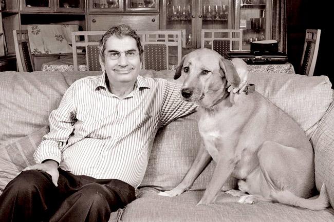 Vinod Mehta relaxes at home with his pet dog, Editor