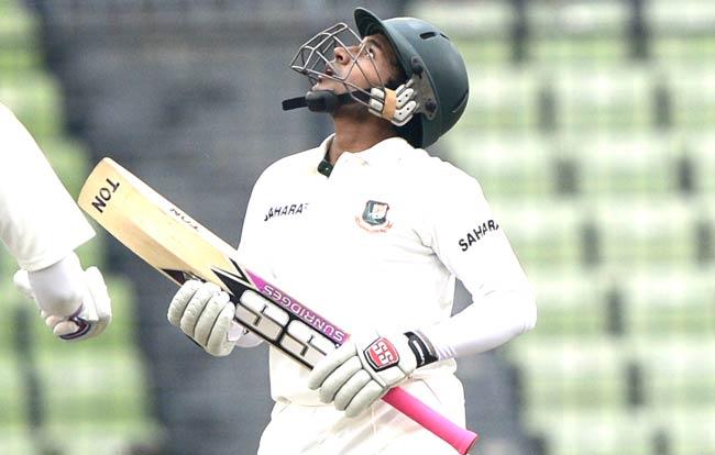 Bangladeshi cricket captain Mushfiqur Rahim reacts after scoring a half century (50 runs) during the second day of the first cricket Test match between Bangladesh and Zimbabwe at the Sher-e Bangla National Stadium in Dhaka. Pic/AFP