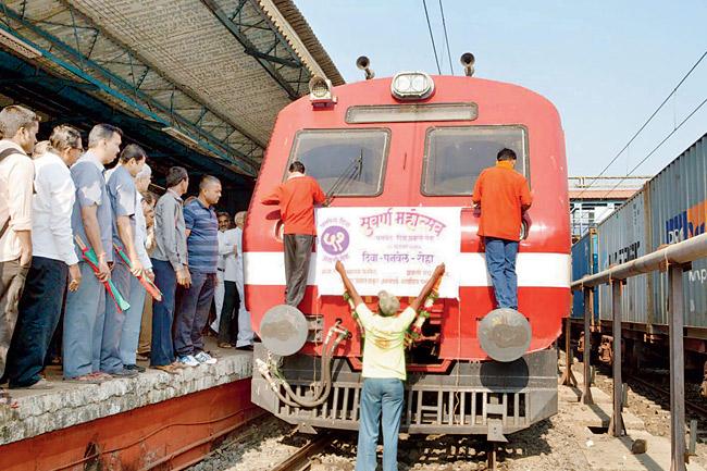 TRAIN WAVE: A golden jubilee run as banners are put up on the train to mark the occasion