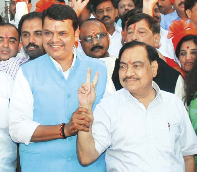 After Eknath Khadse (right) agreed to support Devendra Fadnavis, the other contenders reportedly toed the party line