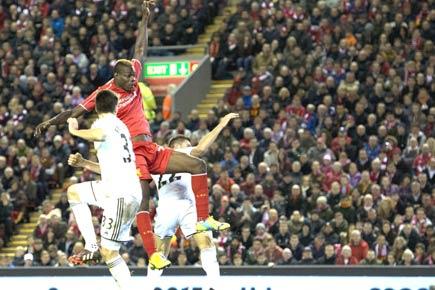 Balotelli scores as Liverpool knock out Swansea in League Cup