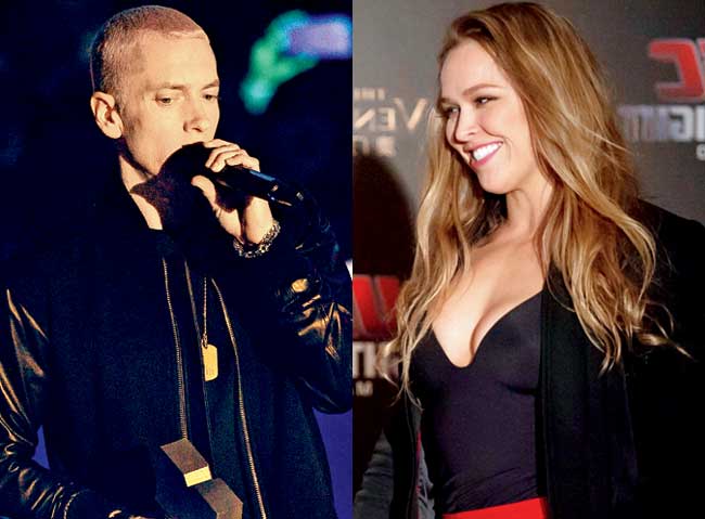 Eminem and Ronda Rousey. Pics/Getty Images
