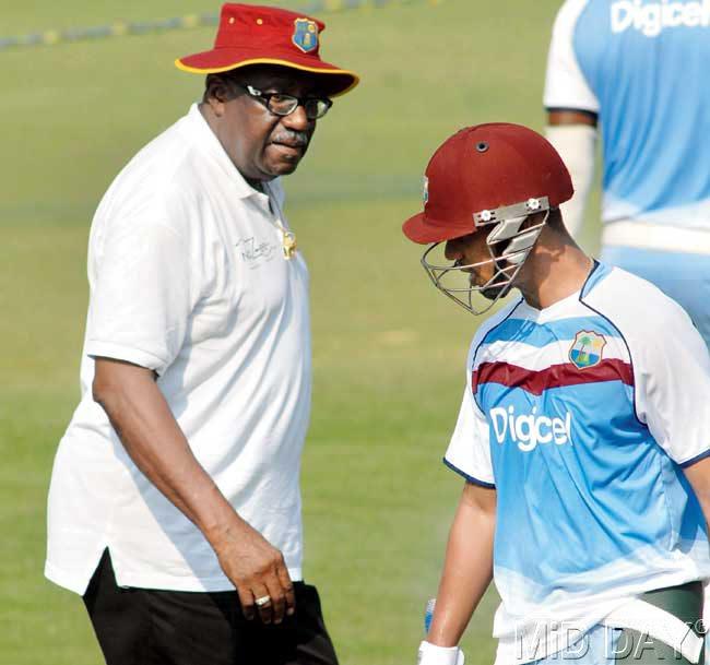 Clive Lloyd with Lendl Simmons in Brabourne yesterday