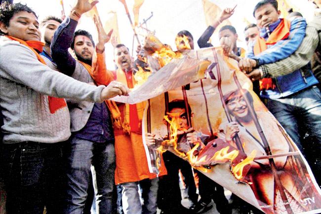 Bajrang Dal activists protest against PK in Jammu. Pic/ PTI