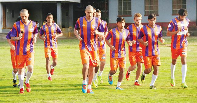 Team members from FC Pune City go through the drills at the St Vincent’s school ground. 