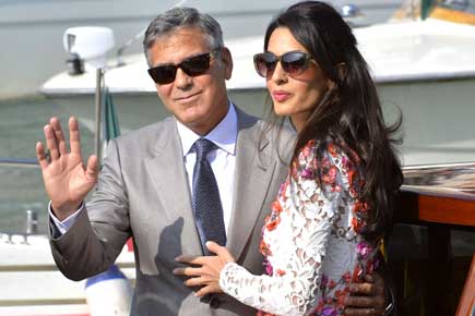 George Clooney to auction wedding pics for noble cause
