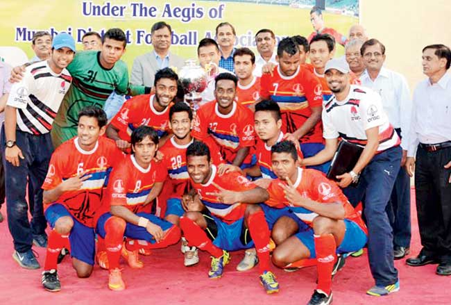 Victors ONGC with the Nadkarni Cup trophy at Chembur yesterday