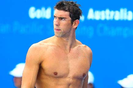 Swimmer Michael Phelps banned for six months, no 2015 World C'ships
