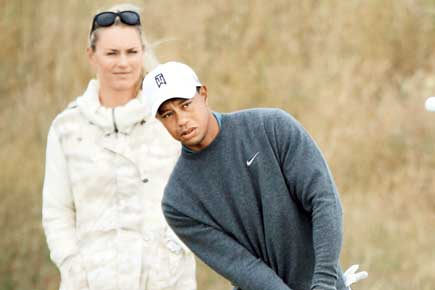 I competed and Lindsey Vonn won!: Tiger Woods erupts with joy