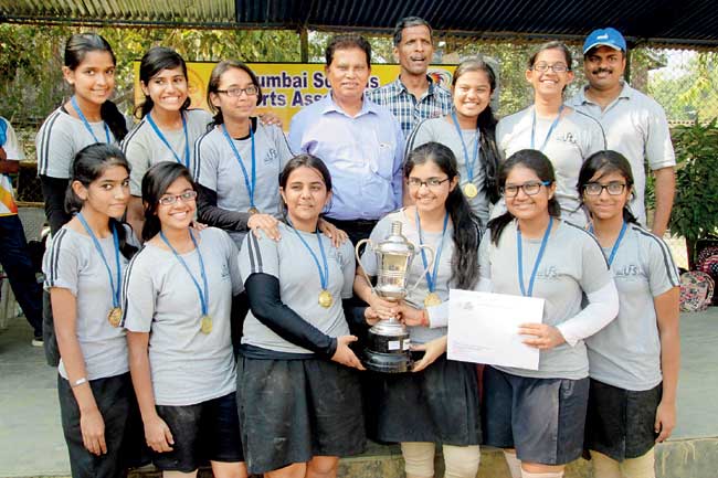 Lokhandwala Foundation School girls with their MSSA throwball trophy