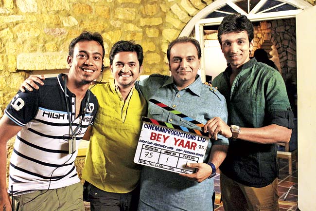 Finding a youthful voice: Filmmaker Abhishek Jain (left) with the cast of Bey Yaar. After the film released in 2012 and ran for an astonishing 16 weeks it even got a multiplex outing in Mumbai and did well commercially, the trend in Gujarati cinema moved to fresh and urban stories about young people