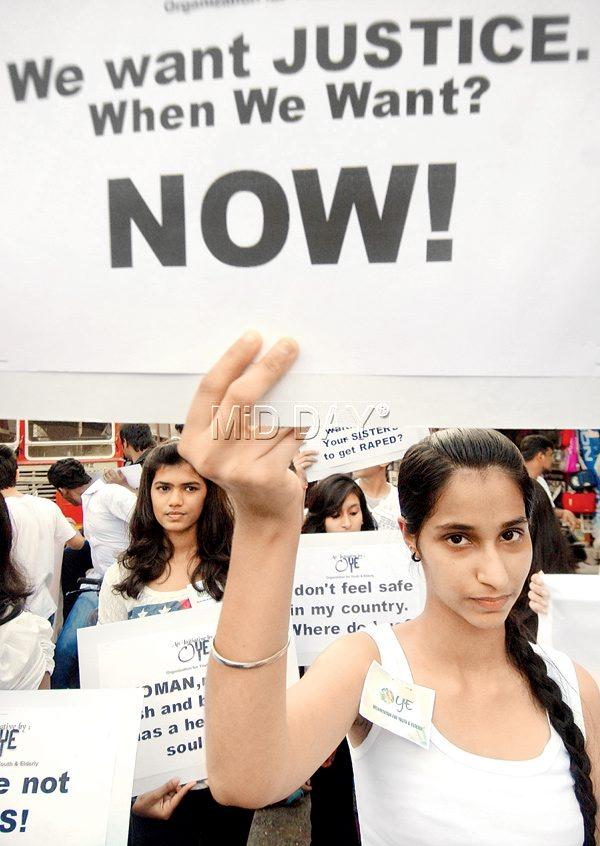 City college students take part in rally against the Delhi rape victim case in Delhi in  2013.