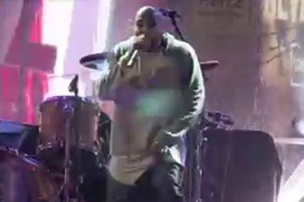 Kanye West performs at the World Aids Day concert