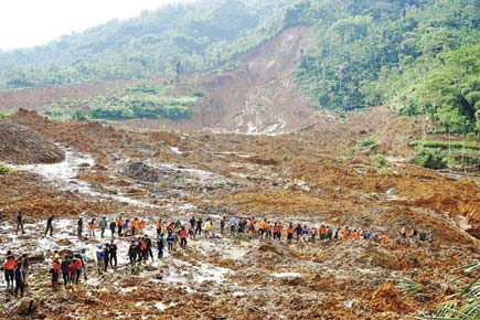 19 dead, around 100 missing in Indonesian landslide