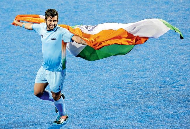 Manpreet Singh celebrates after India clinched the Asian Games gold medal