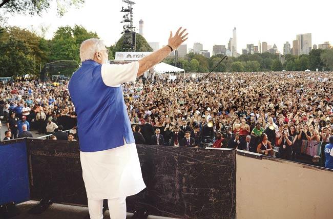 Reams and reams have now been written on the meetings that PM Modi had in the five days in New York and Washington DC, the CEOs that he met, the presidents and prime ministers he interacted with, and common people of Indian origin. To each he promised a new India. Pic/Getty Images
