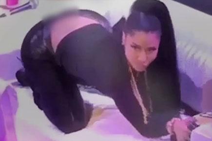 Nicki Minaj has an oops moment while twerking on couch