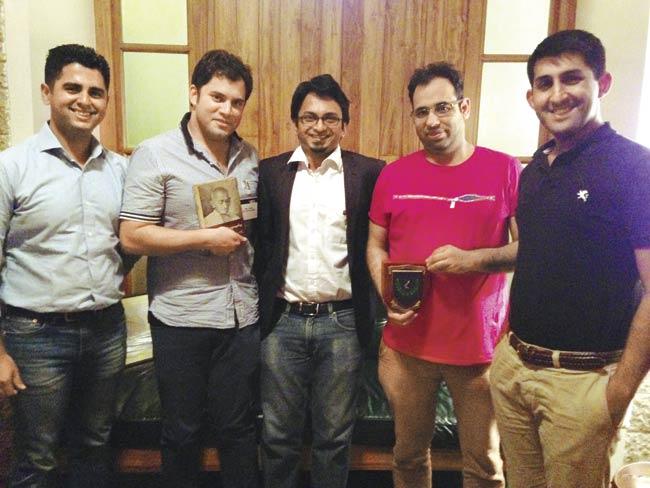 (L to R) Pratish Panjabi (lawyer), Mark Trayling (UCL India alumni relations ambassador), Savin Vijay (Director, Arigel Design Studio), Rohit Sharma (lawyer) and Dr Marcus Ranney (Global Shaper, World Economic Forum). The autobiography of Gandhi in the photo belongs to Mark Trayling’s family. It was a wedding gift to his parents and was signed by former Indian Prime Minister Morarji Desai in 1977