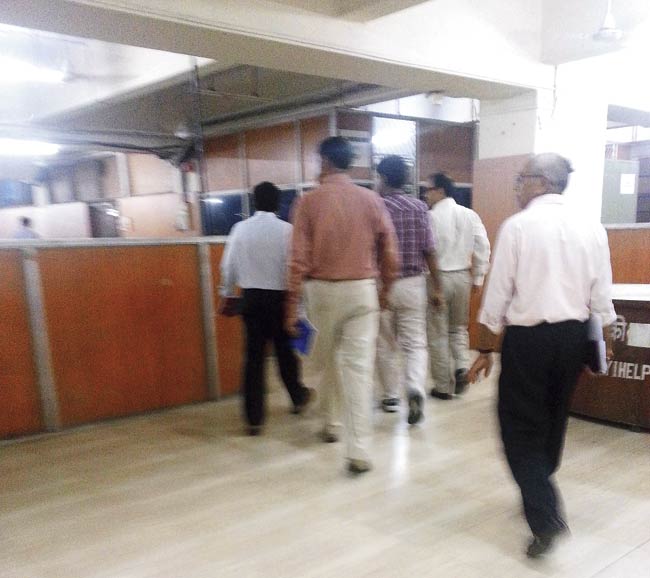 A team of senior officers is closely inspecting the Churchgate station building to ensure that it is spick and span