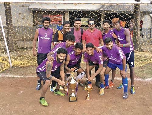 UK United (team owner Ronnie D’Souza is in the centre) with their trophy after winning the Goan Outreach Association instant football tournament at the Fatima School ground in Vidyavihar on Sunday
