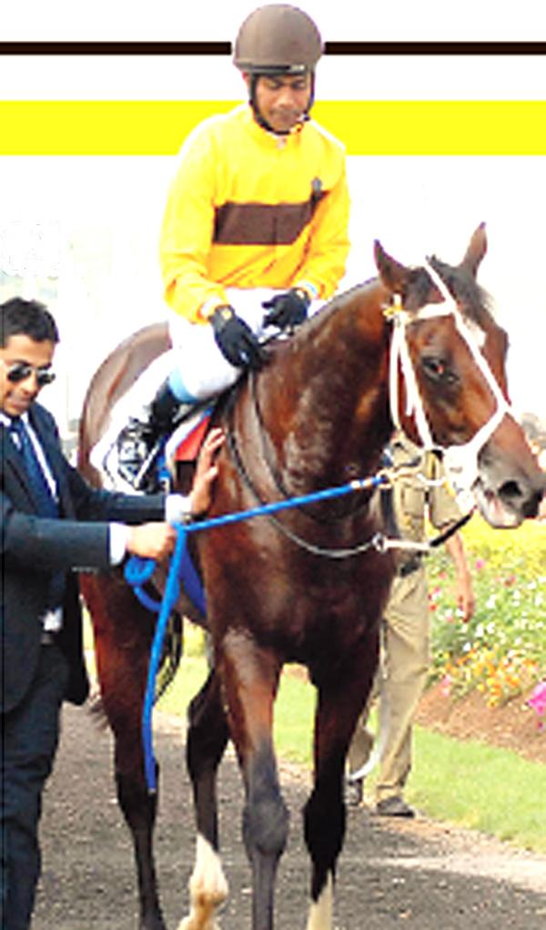 Suraj Narredu with the winning horse, Be Safe