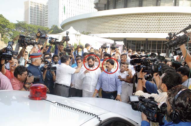 As opposition members, Shiv Sena MLAs Eknath Shinde (circled, left) and Ravindra Waikar (circled, right) were at the forefront of the protest which also saw the governor being heckled against the way the BJP had conducted the trust vote on November 12. File pic
