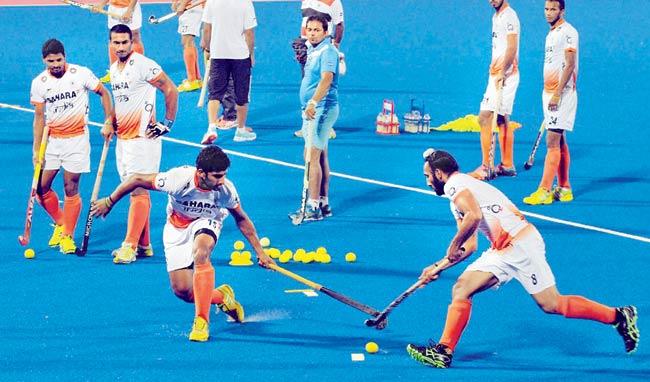 Team India practice on the eve of their mouth-watering clash against arch-rivals Pakistan in the Champions Trophy semi-finals at the Kalinga Stadium