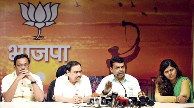 Fadnavis’s cabinet will include Vinod Tawde (left), Eknath Khadse (second from left), Pankaja Munde-Palwe (right) and Sudhir Mungantiwar. While Khadse has demanded the revenue and forest ministries, Munde may be given rural development, and Mungantiwar PWD or home. File pics